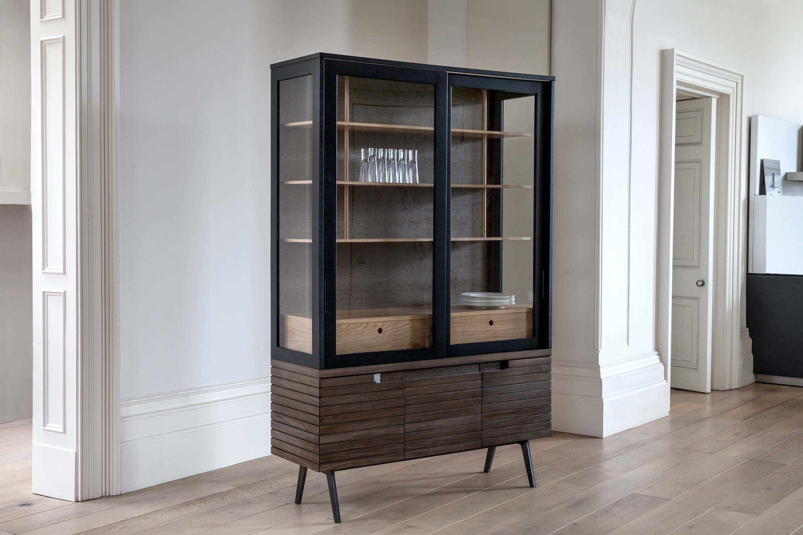 Handmade fumed oak dresser with glass doors by Six Hands
