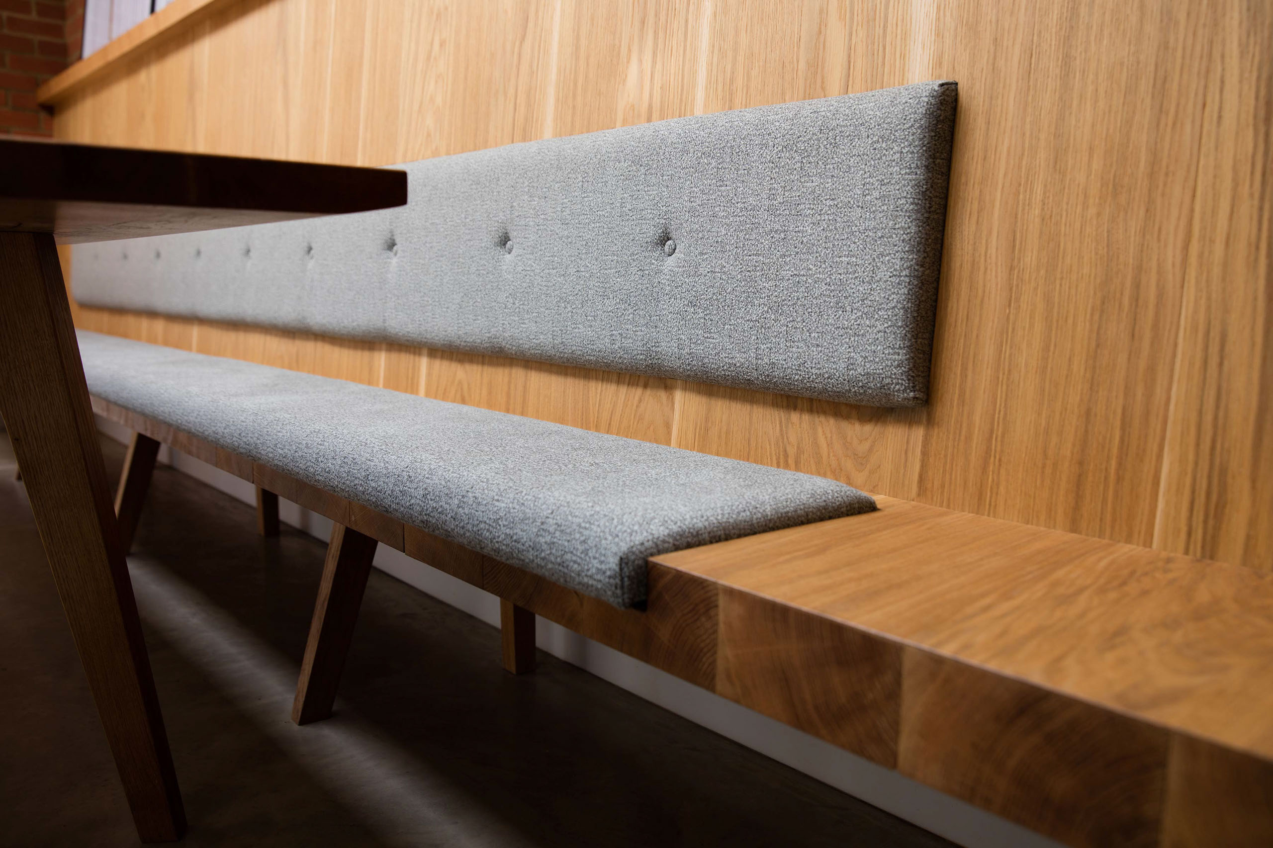 Built in upholstered banquette bench seating by Six Hands